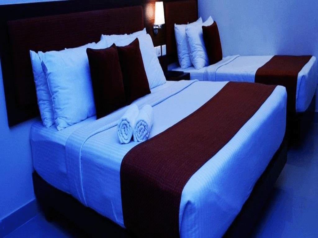 Hotel The Gopinivas Grand Kanjákumárí Pokoj fotografie