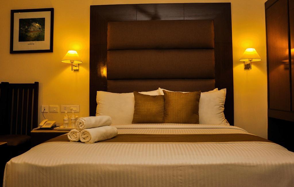 Hotel The Gopinivas Grand Kanjákumárí Pokoj fotografie