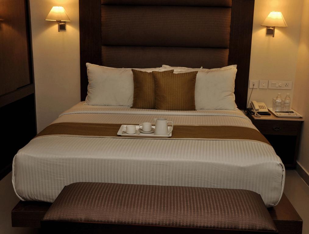 Hotel The Gopinivas Grand Kanjákumárí Pokoj fotografie